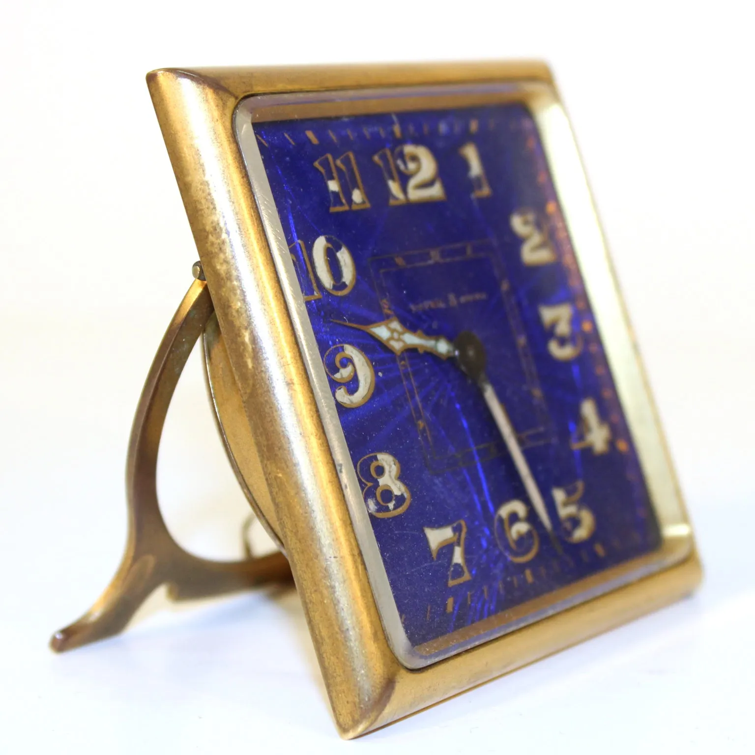 French Art Deco 'Reveil 8 Jours' Brass Clock with Purple-Blue Enamel