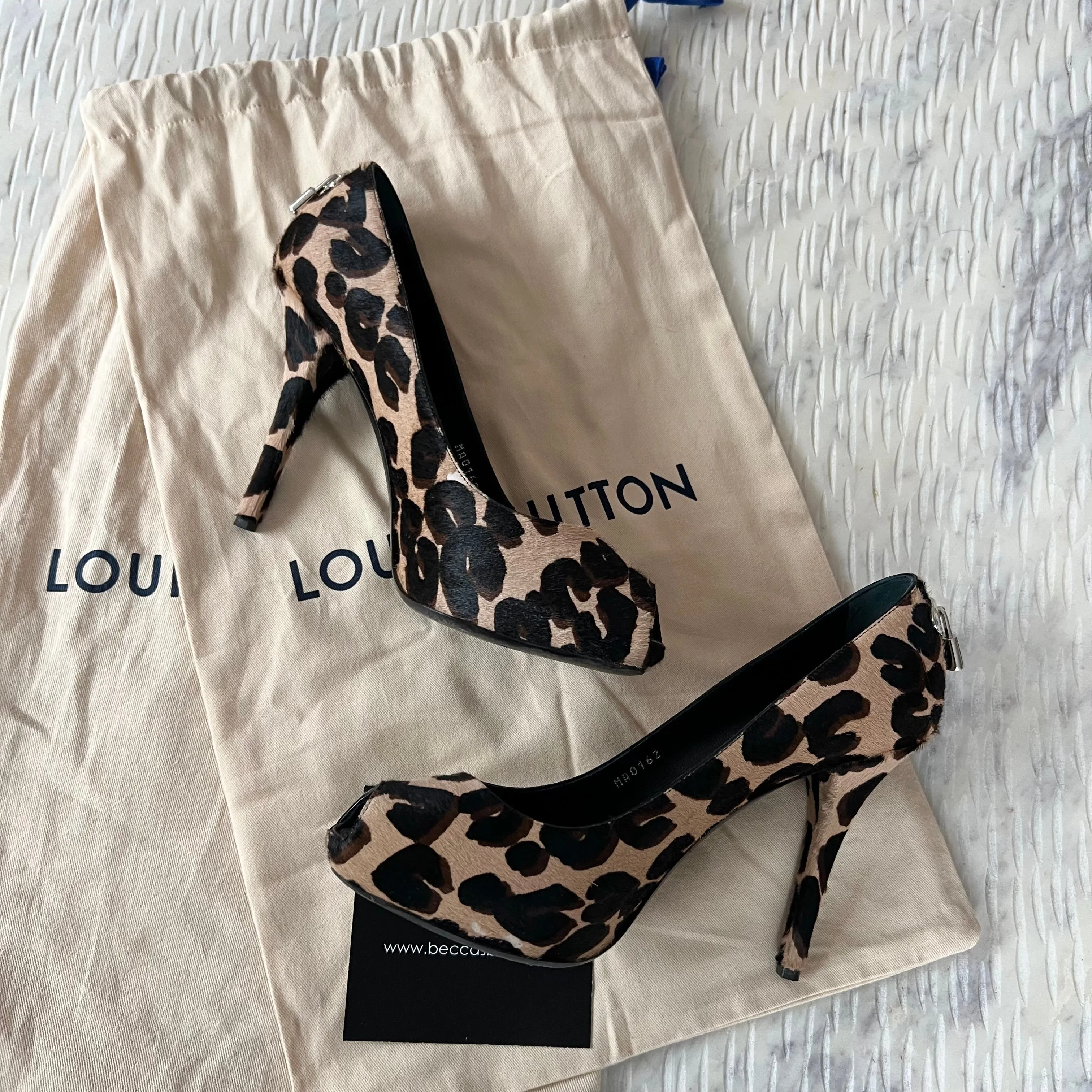 Louis Vuitton Leopard Lock Heels